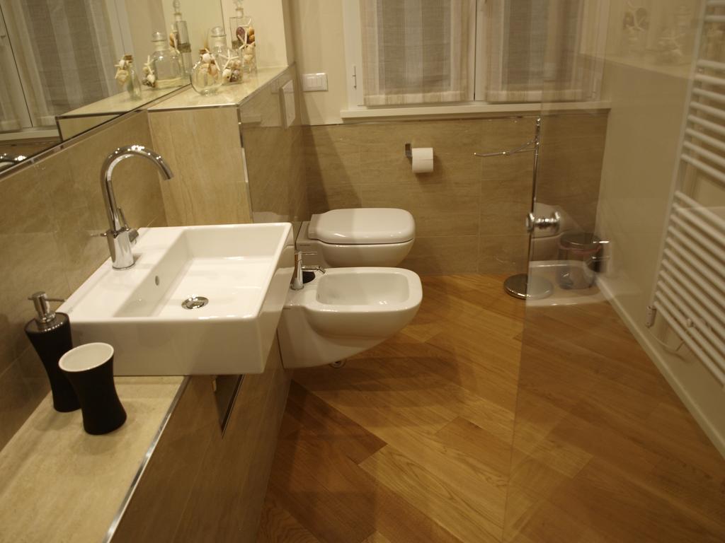 Il Pontile Holidays Apartment 马里纳-迪-皮特拉桑塔 客房 照片